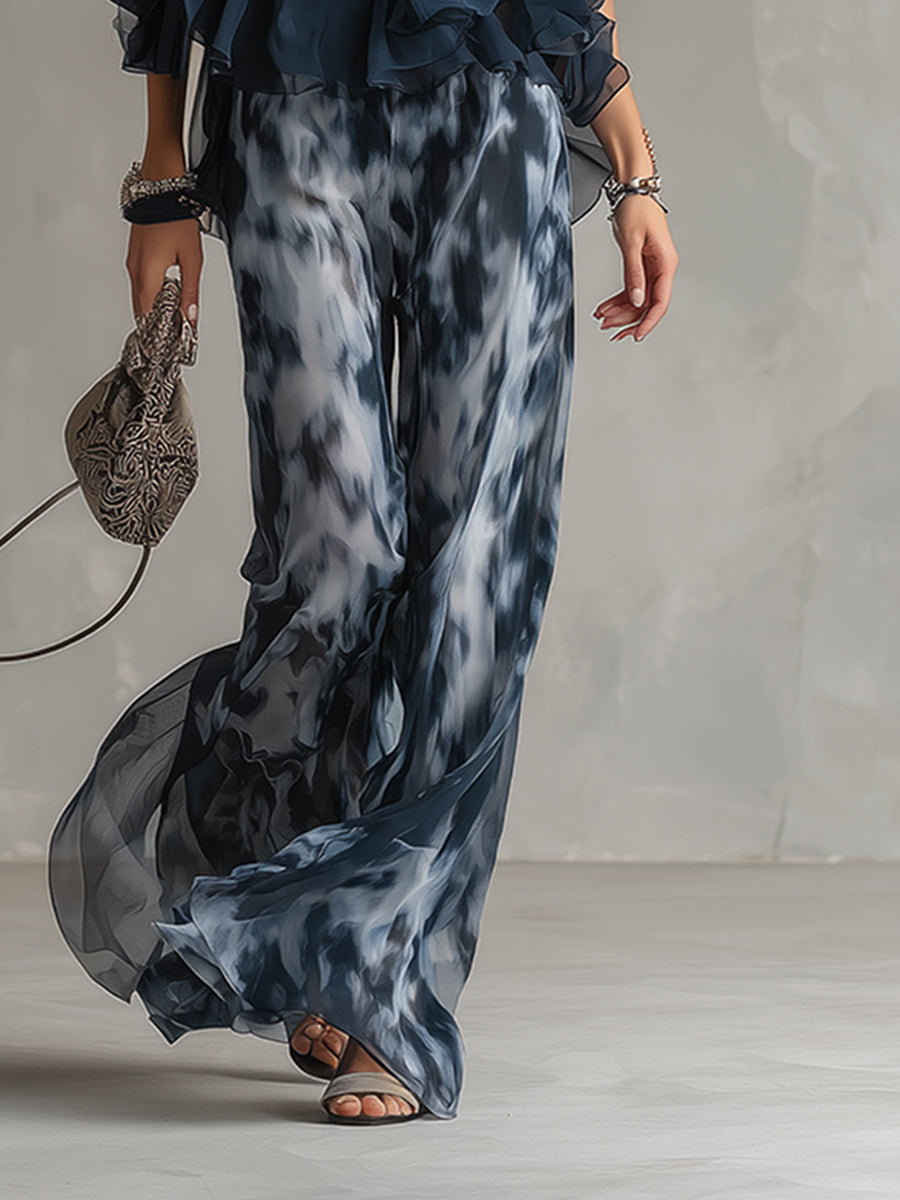 Ludovica - elegante en chiffón con top de cuello alto y pantalones anchos estampados