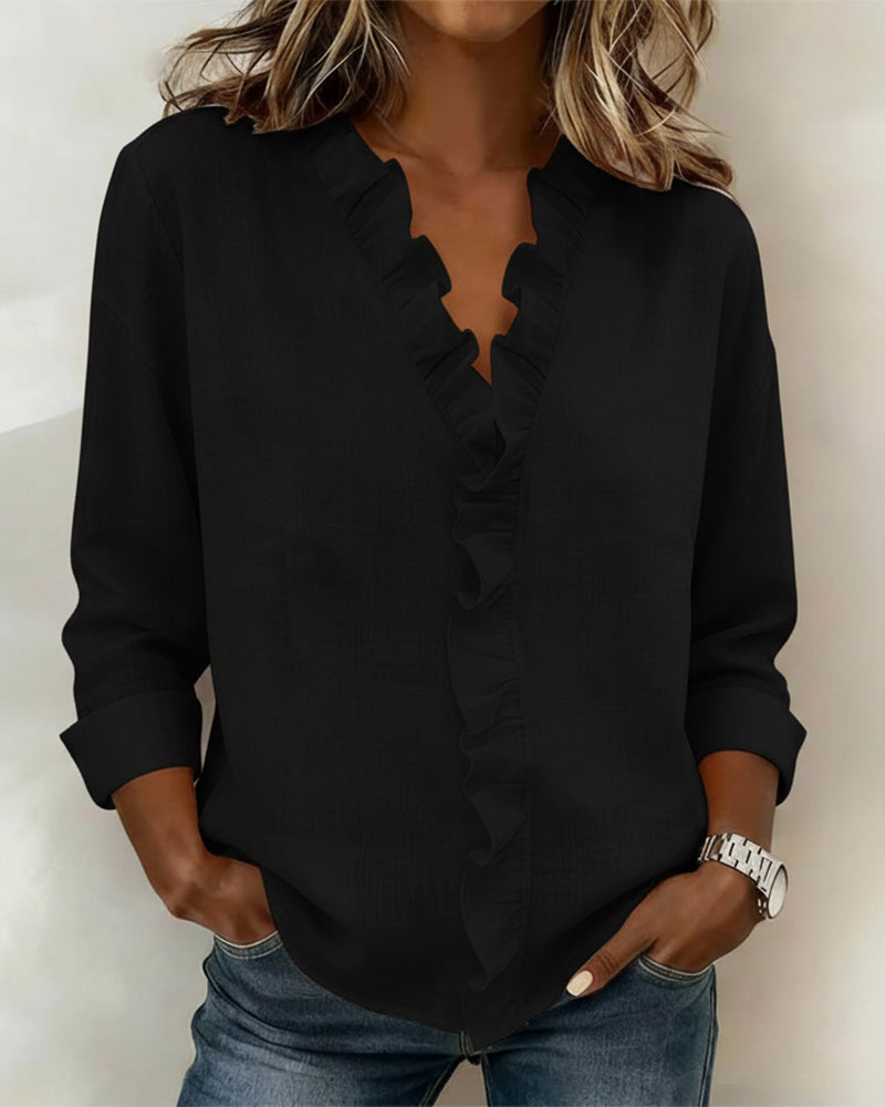 Blusa de manga larga con volantes y escote en V