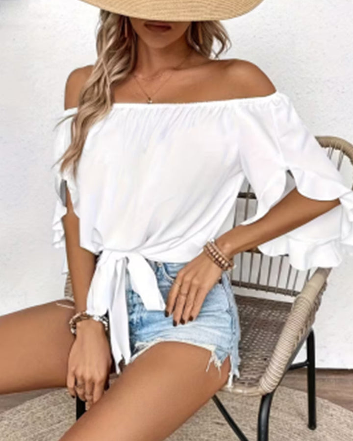 Blusa hombros descubiertos con nudo y mangas acampanadas