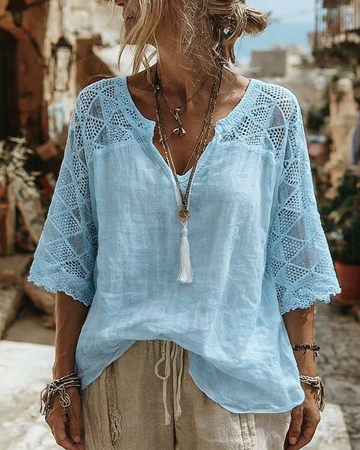 Blusa lisa panelada con escote en V