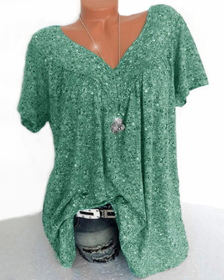 Camiseta holgada de manga corta y escote en V