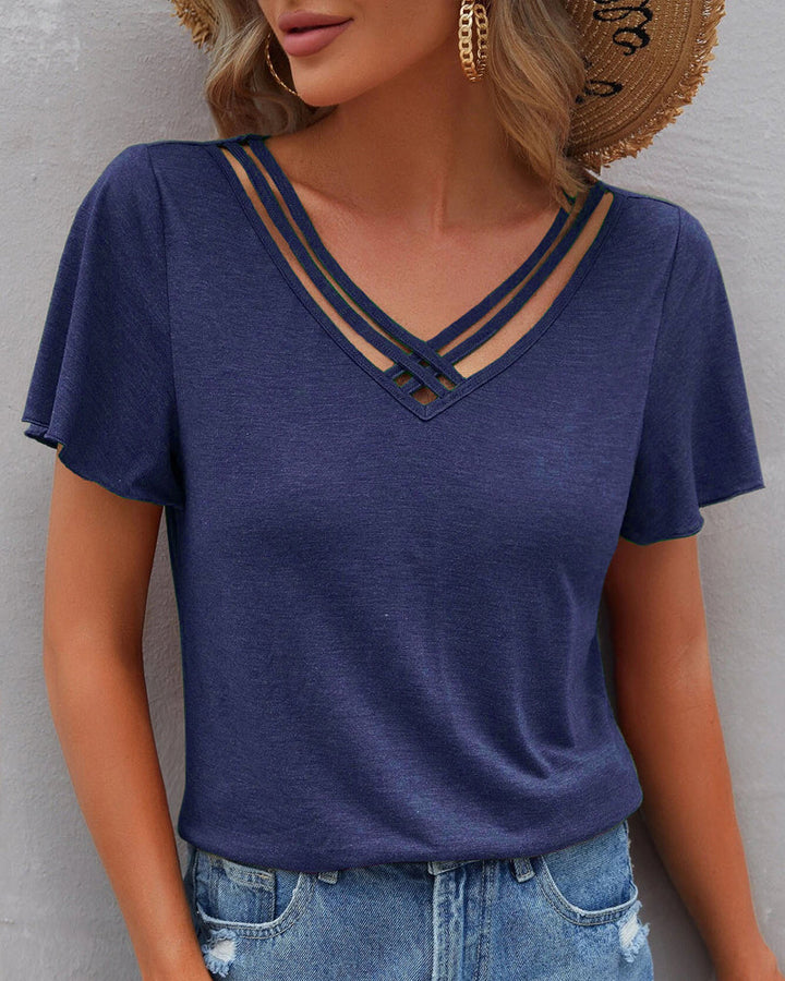 Camiseta con recortes de color sólido