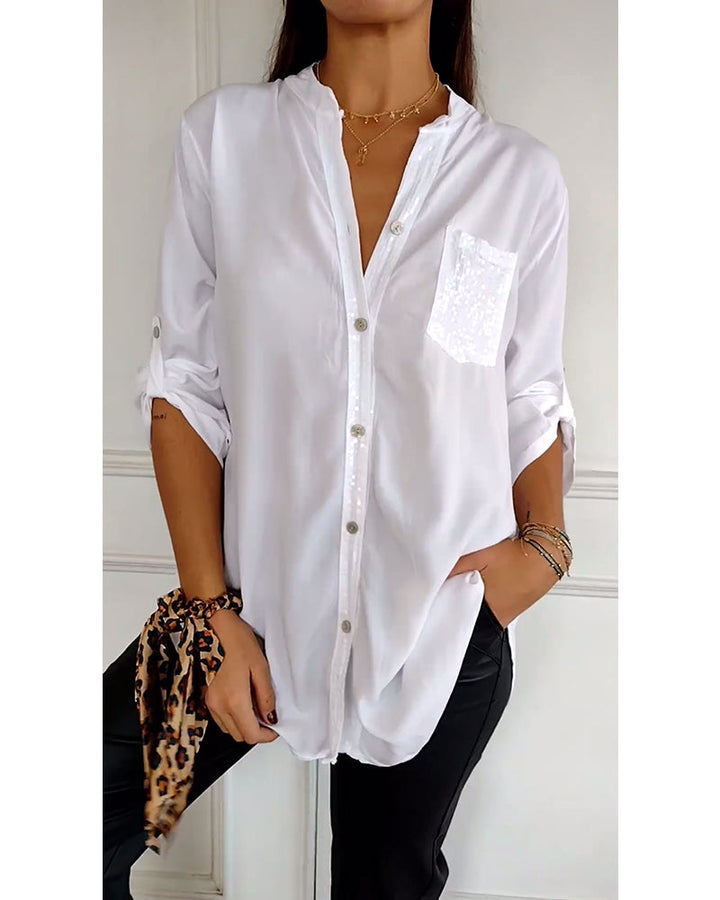 Top casual con paneles y botones con lentejuelas