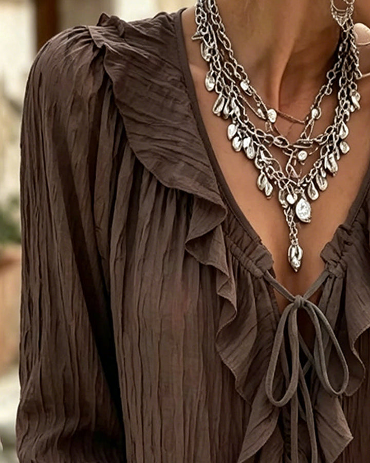 Blusa de manga larga con volante y ribete de encaje
