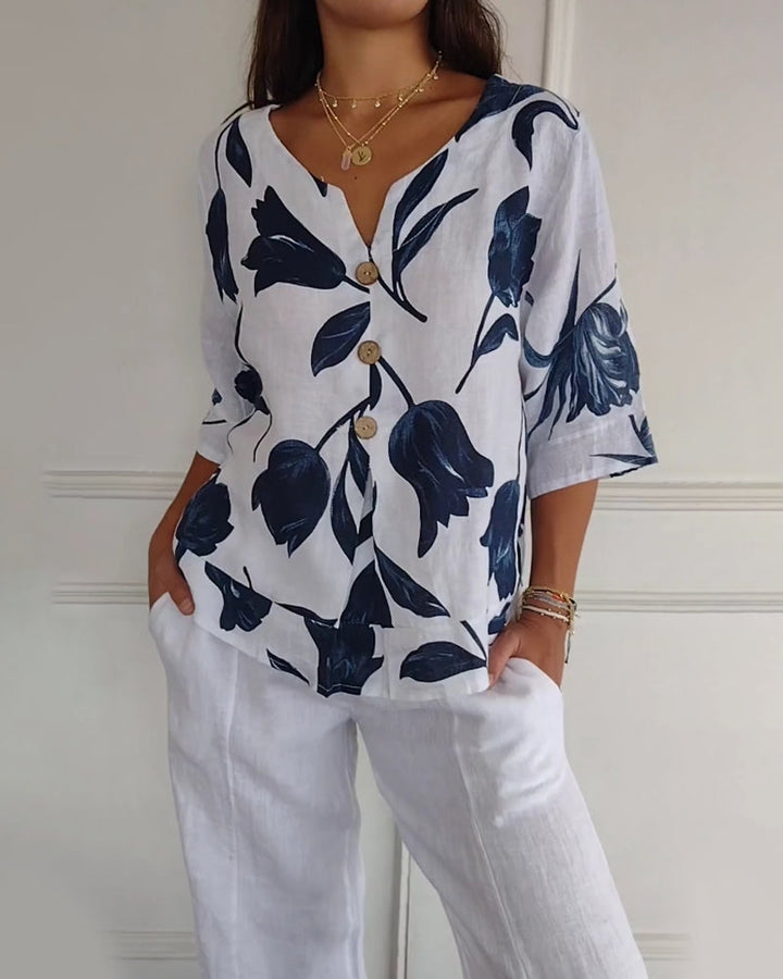 Top abotonado de algodón y lino con estampado floral