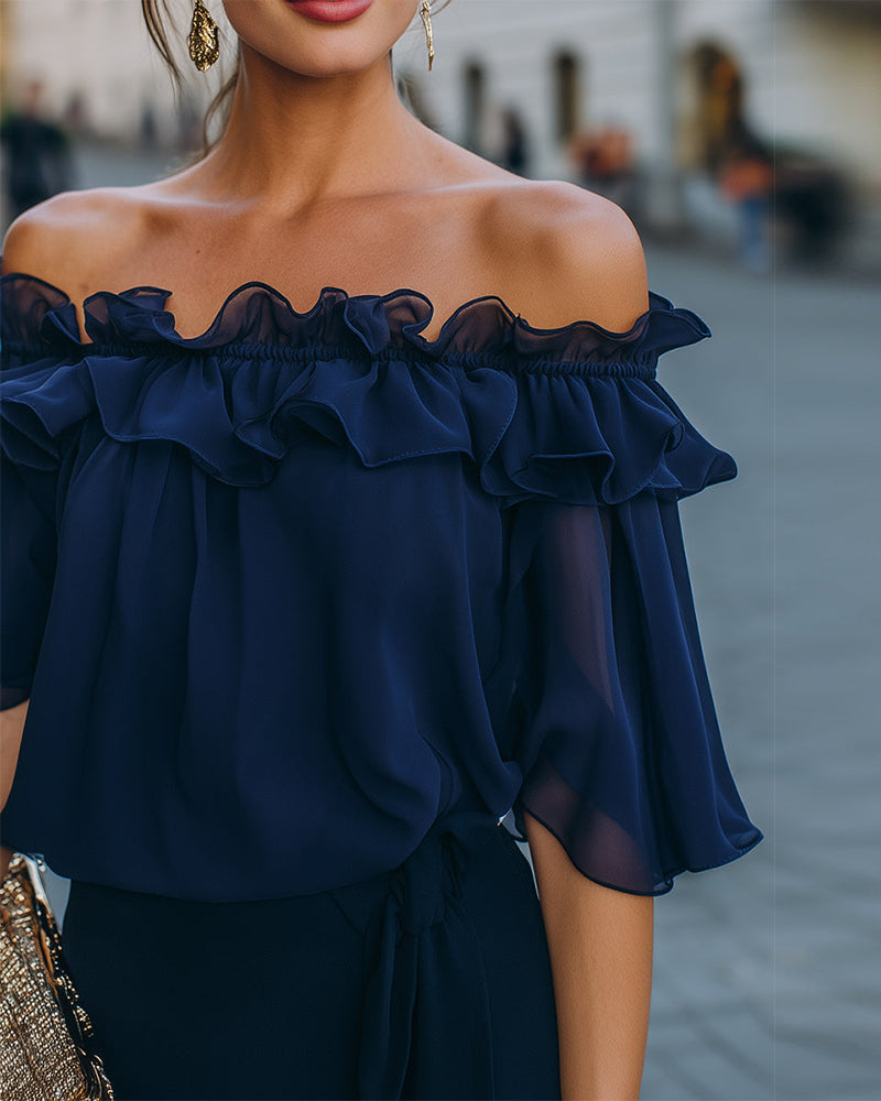 Blusa elegante sin hombros con volantes