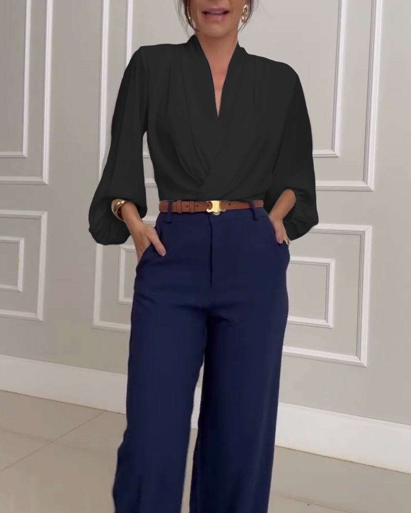 Blusa de moda con mangas farol y escote en V de color sólido