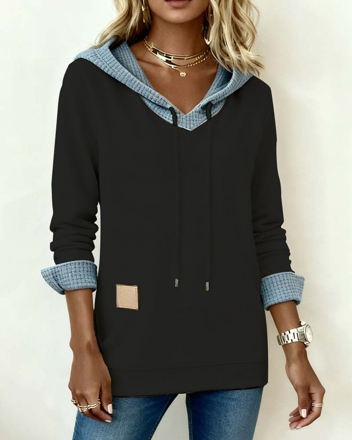 Sudadera con capucha casual y paneles en relieve