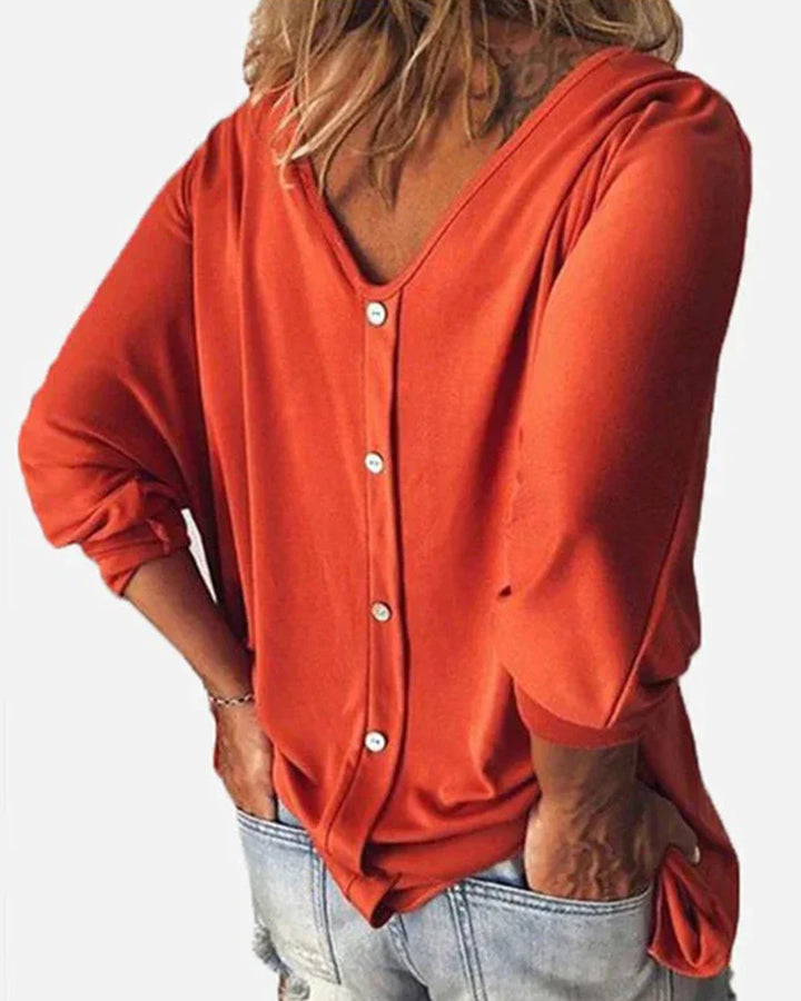 Top de cuello en V con botones en la espalda, mangas 3/4