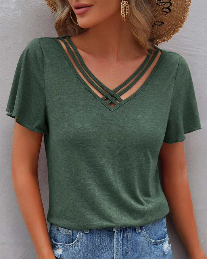 Camiseta con recortes de color sólido