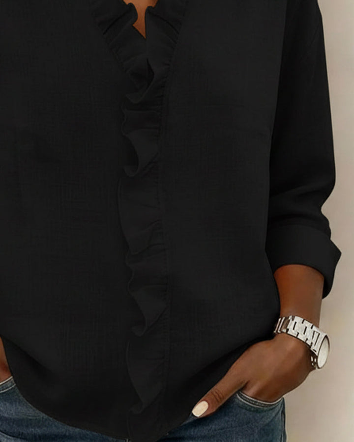 Blusa de manga larga con volantes y escote en V