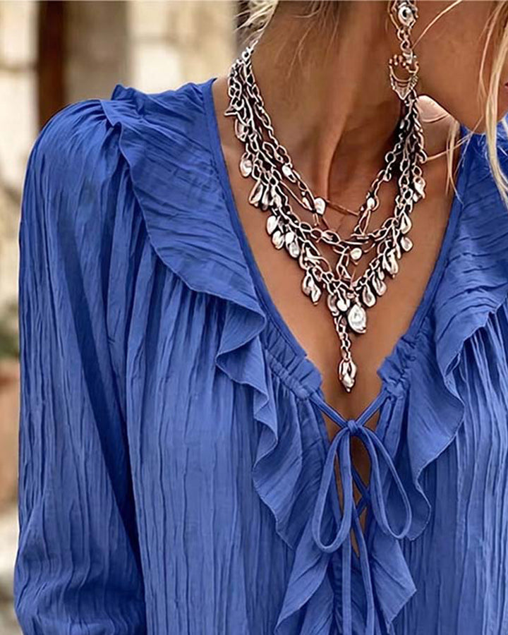 Blusa de manga larga con volante y ribete de encaje
