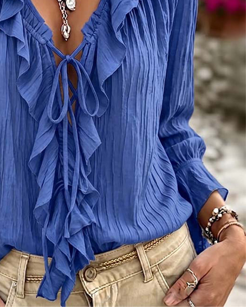 Blusa de manga larga con volante y ribete de encaje