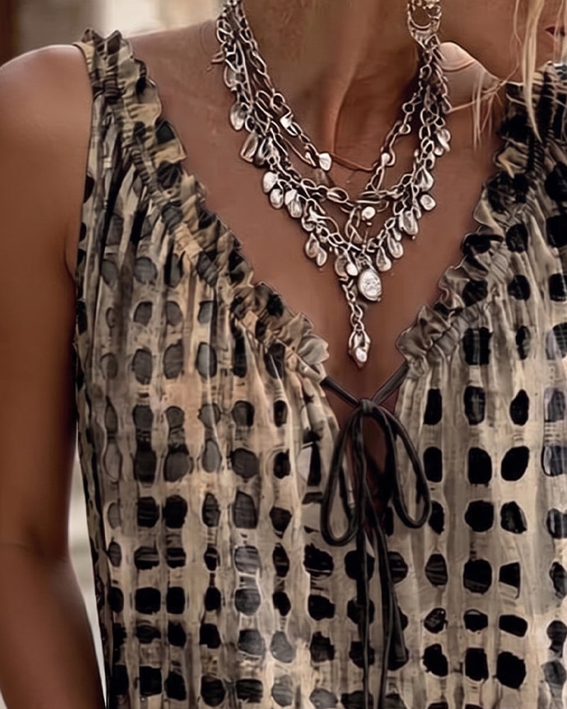 Camisetas sin mangas con estampado de lunares y volante