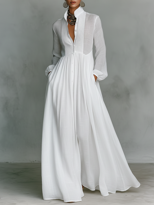 Vestido maxi minimalista en algodón y lino con patchwork, cuello alto y mangas largas
