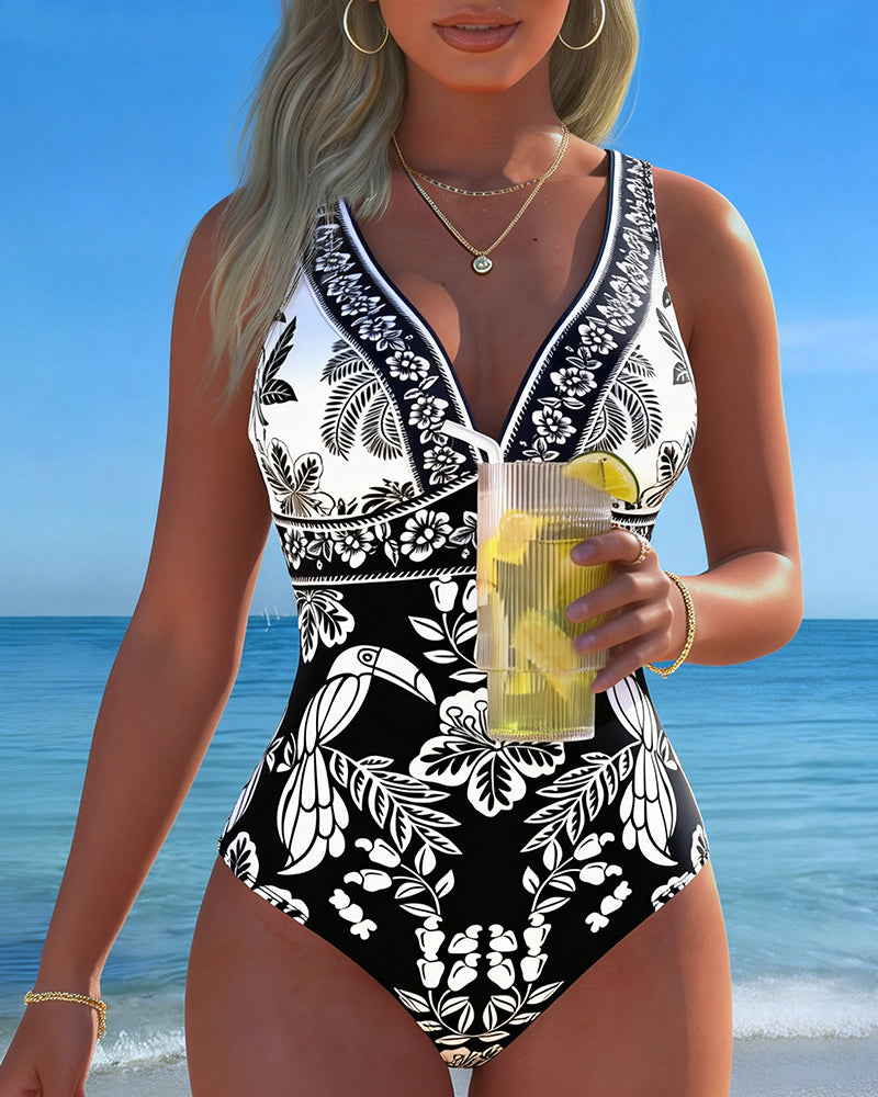 Traje de baño de una pieza tropical con flor y ave