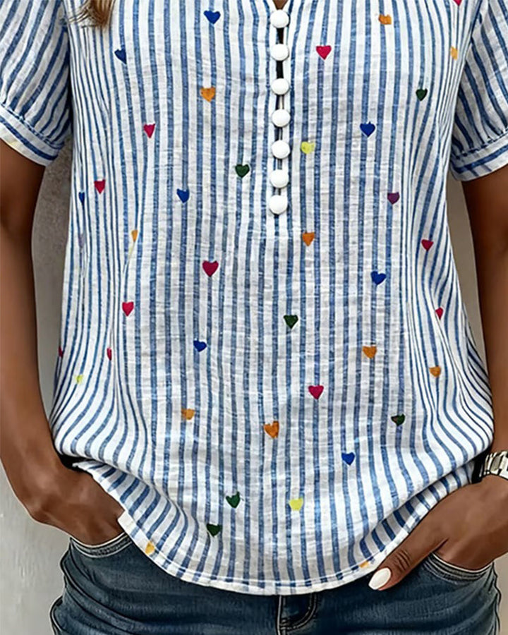 Blusa de mangas abullonadas a rayas con corazón