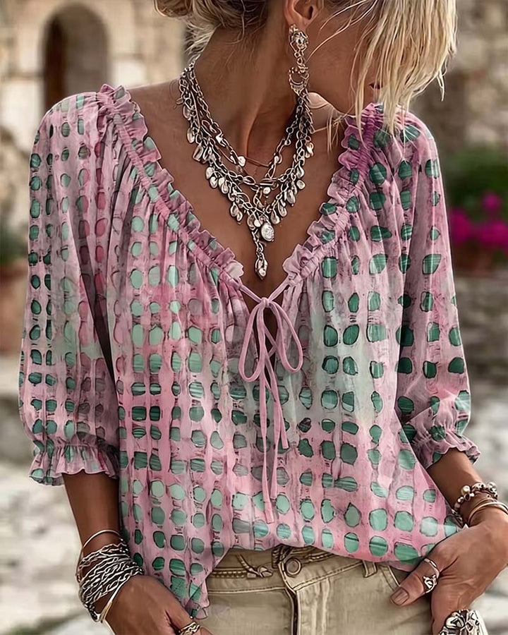 Blusa de lunares con lazos
