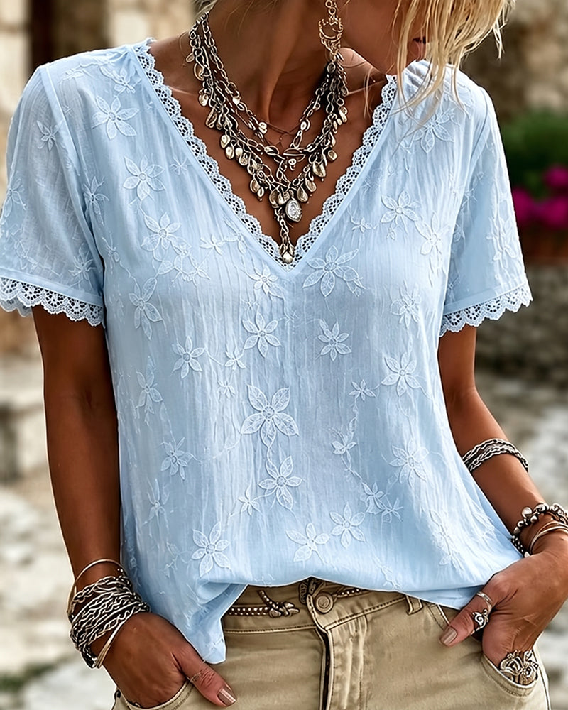 Blusa con escote en V y encaje, mangas cortas