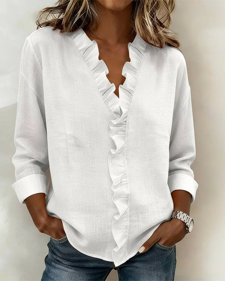 Blusa de manga larga con volantes y escote en V