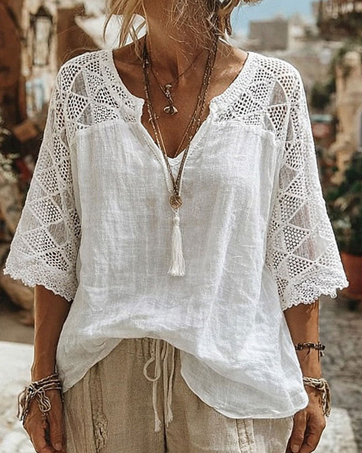 Blusa lisa panelada con escote en V