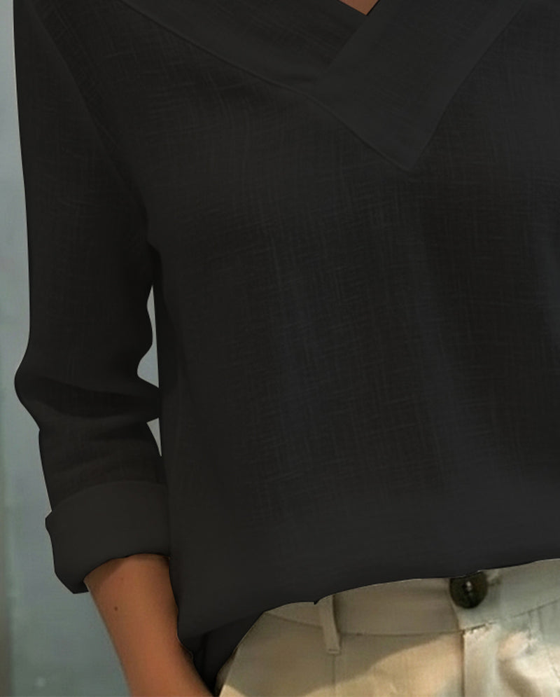Top elegante con escote en V y tirante caído