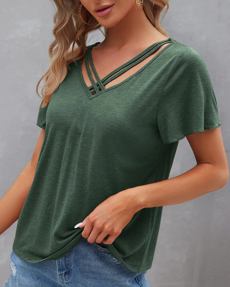 Camiseta con recortes de color sólido