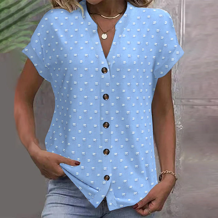 Blusa azul de hombros descubiertos