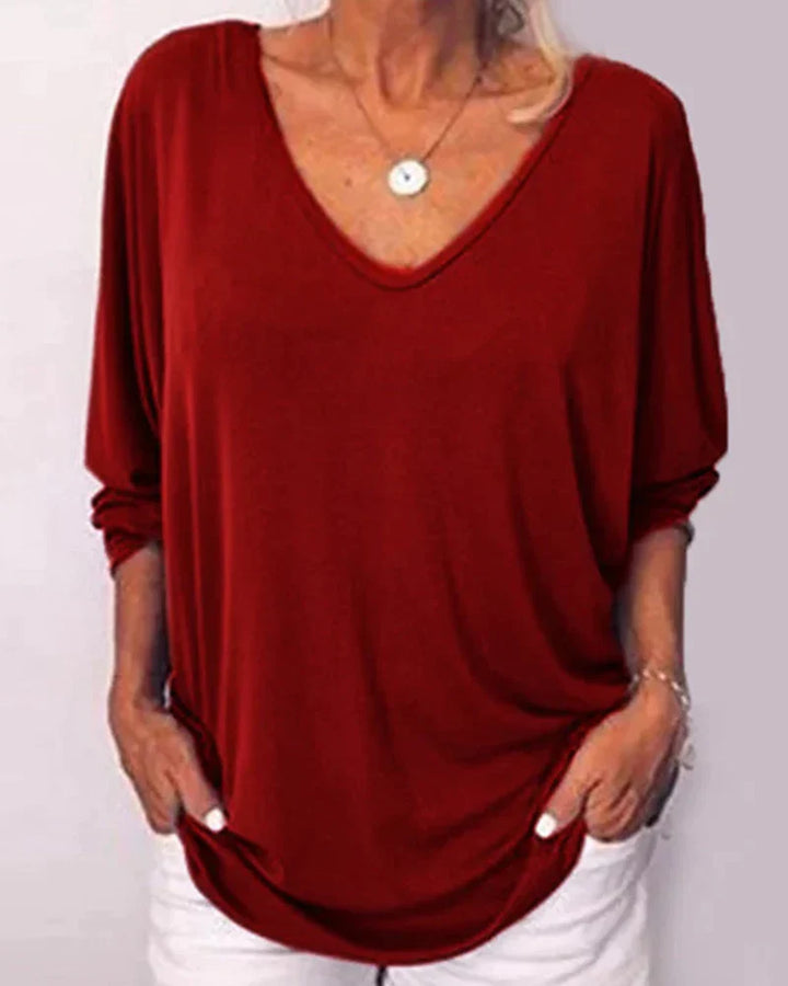 Top de cuello en V con botones en la espalda, mangas 3/4