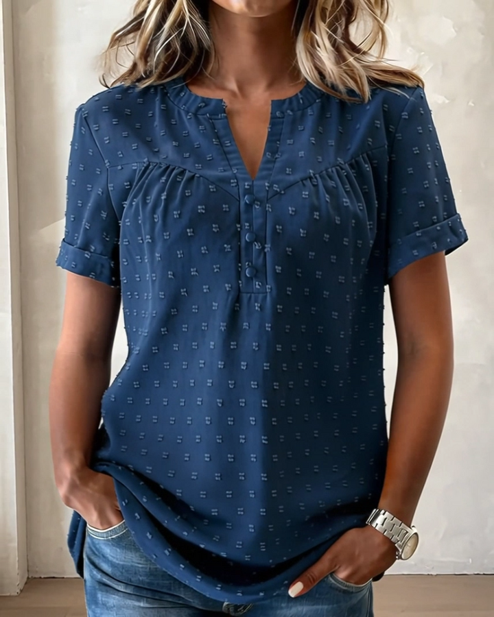 Blusa jacquard con cuello en V y tapeta parcial de manga corta