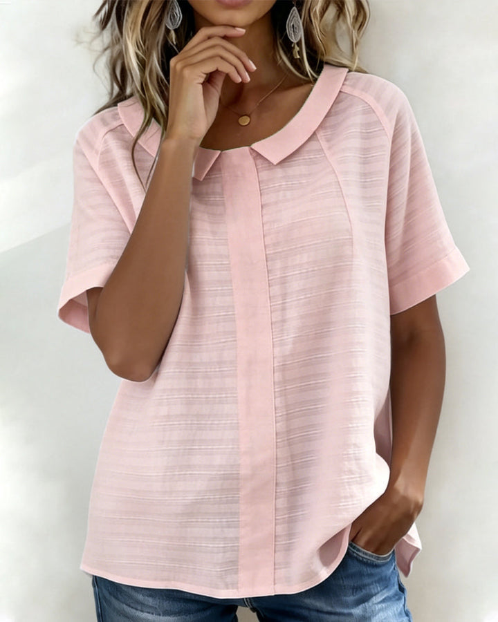 Blusa texturizada con cuello Peter Pan