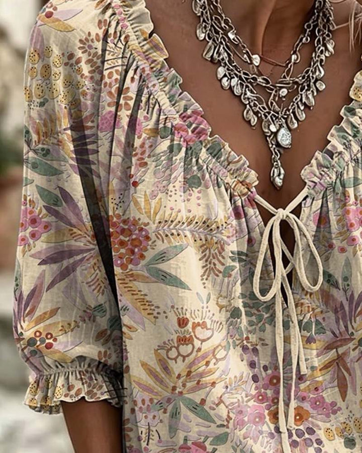 Blusa con escote en V y lazos