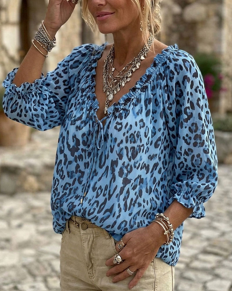 Blusa estampada de leopardo cuello en V mangas abullonadas con lazos