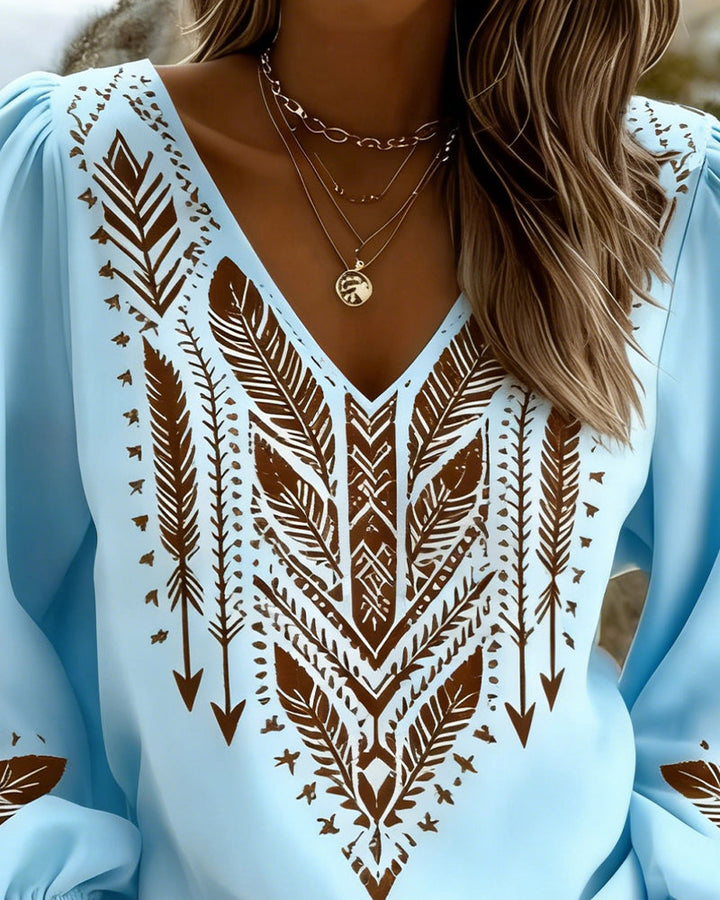 Blusa de manga abullonada con escote en V y corte amplio