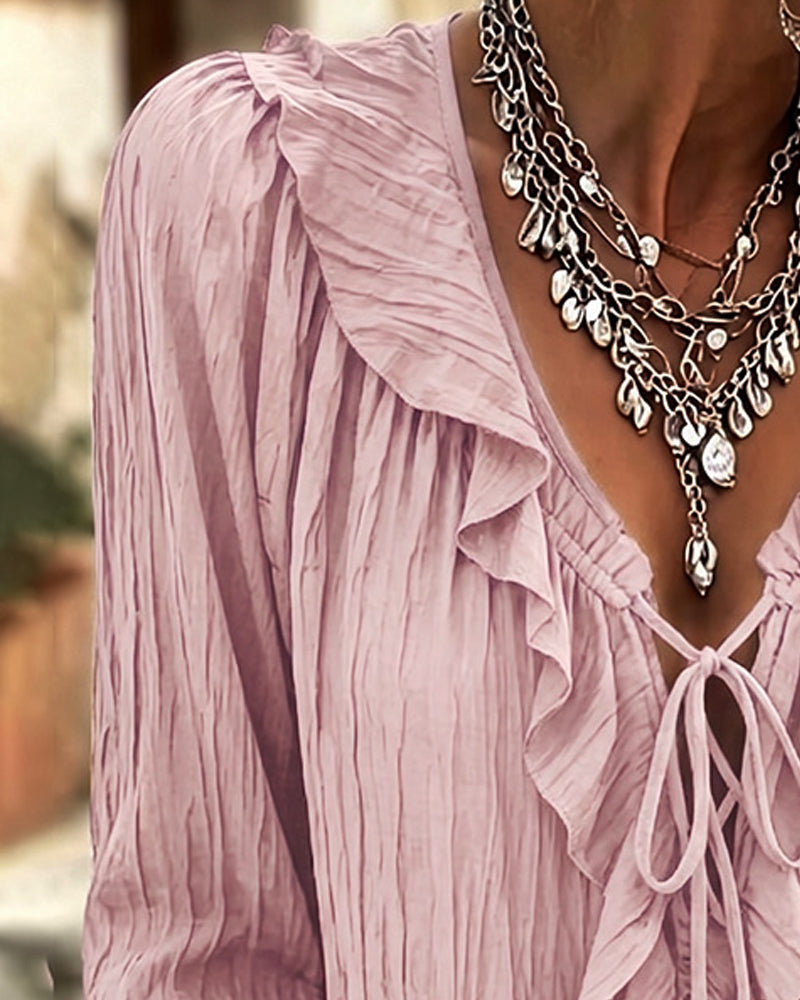 Blusa de manga larga con volante y ribete de encaje