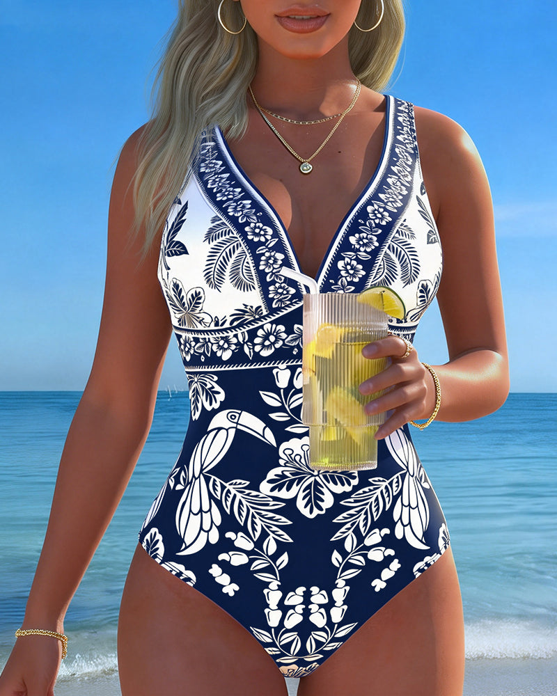 Traje de baño de una pieza tropical con flor y ave