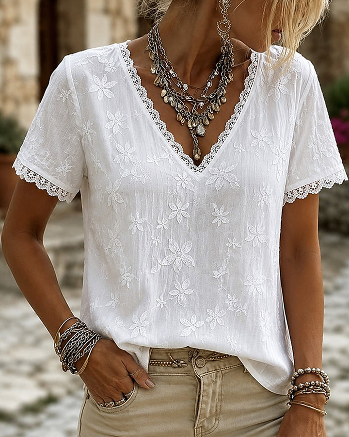 Blusa con escote en V y encaje, mangas cortas