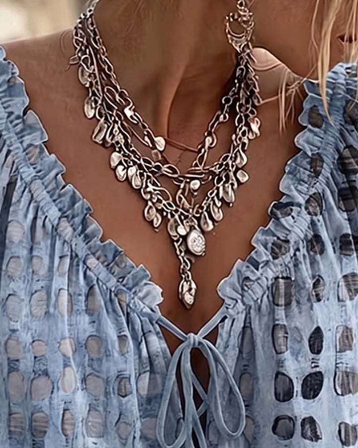 Blusa de lunares con lazos