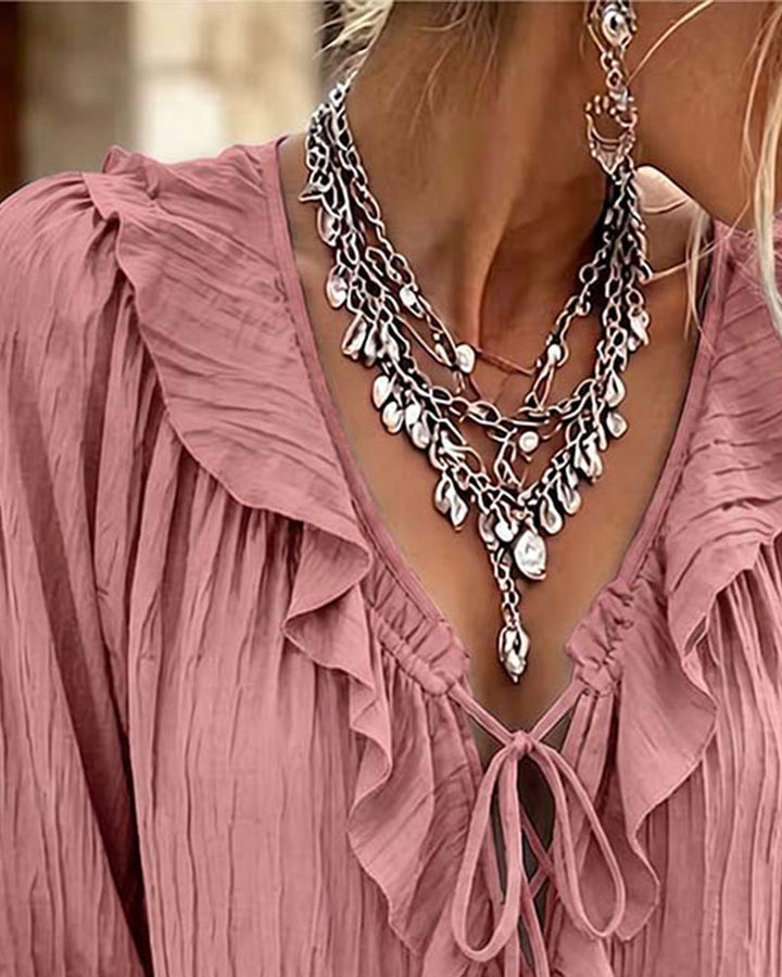 Blusa de manga larga con volante y ribete de encaje