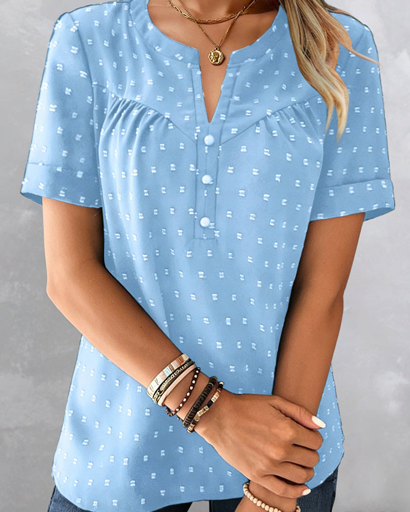 Blusa jacquard con cuello en V y tapeta parcial de manga corta