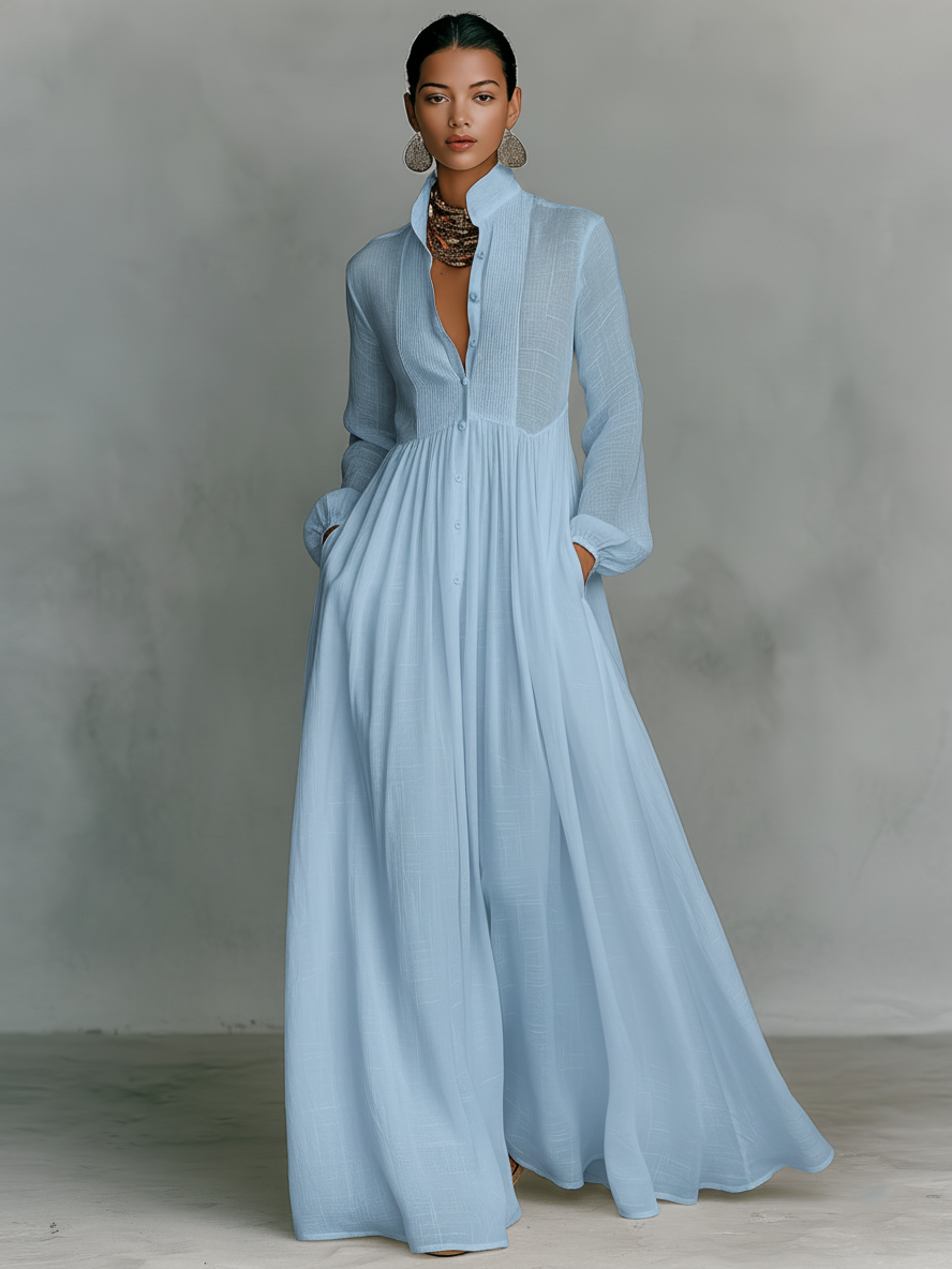 Vestido maxi minimalista en algodón y lino con patchwork, cuello alto y mangas largas