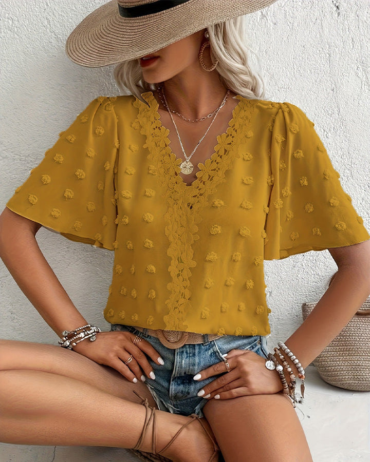 Blusa jacquard con manga volante
