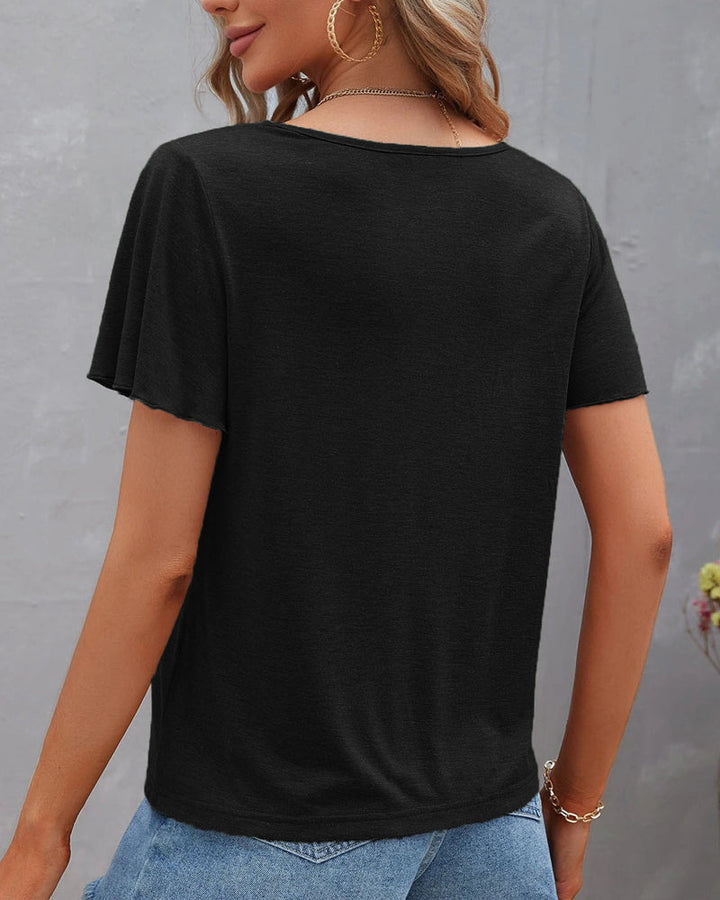 Camiseta con recortes de color sólido