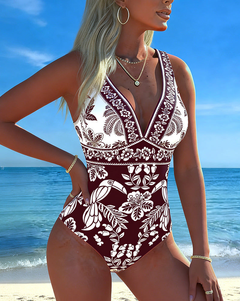 Traje de baño de una pieza tropical con flor y ave