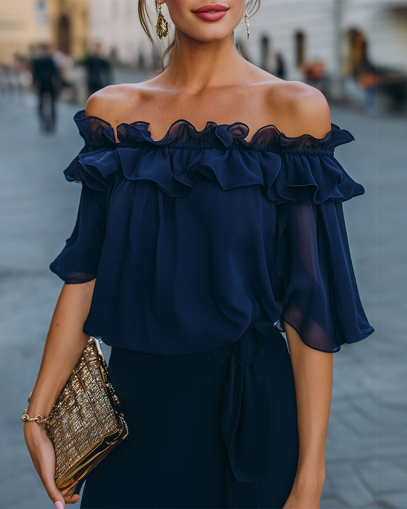 Blusa elegante sin hombros con volantes