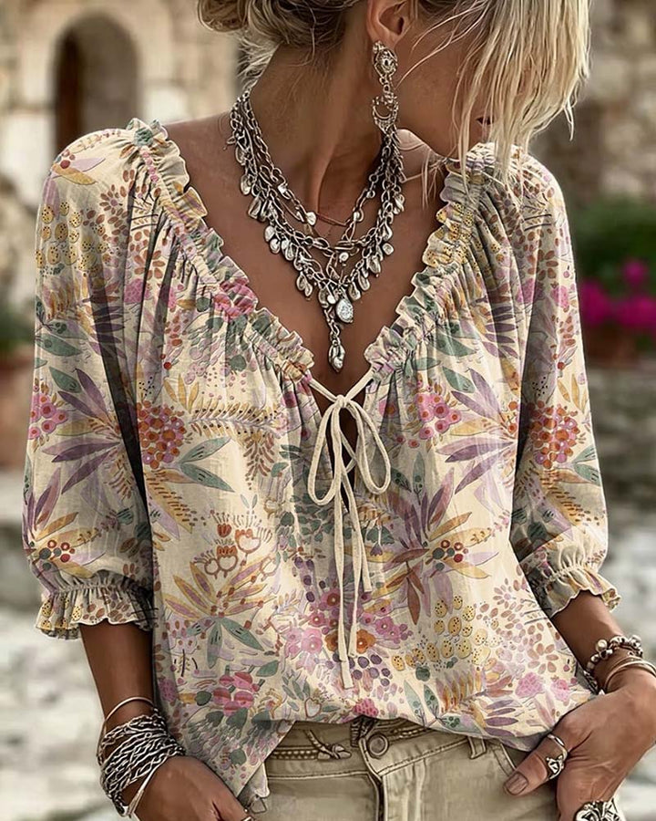 Blusa con escote en V y lazos