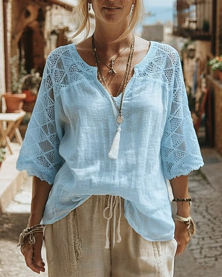 Blusa lisa panelada con escote en V