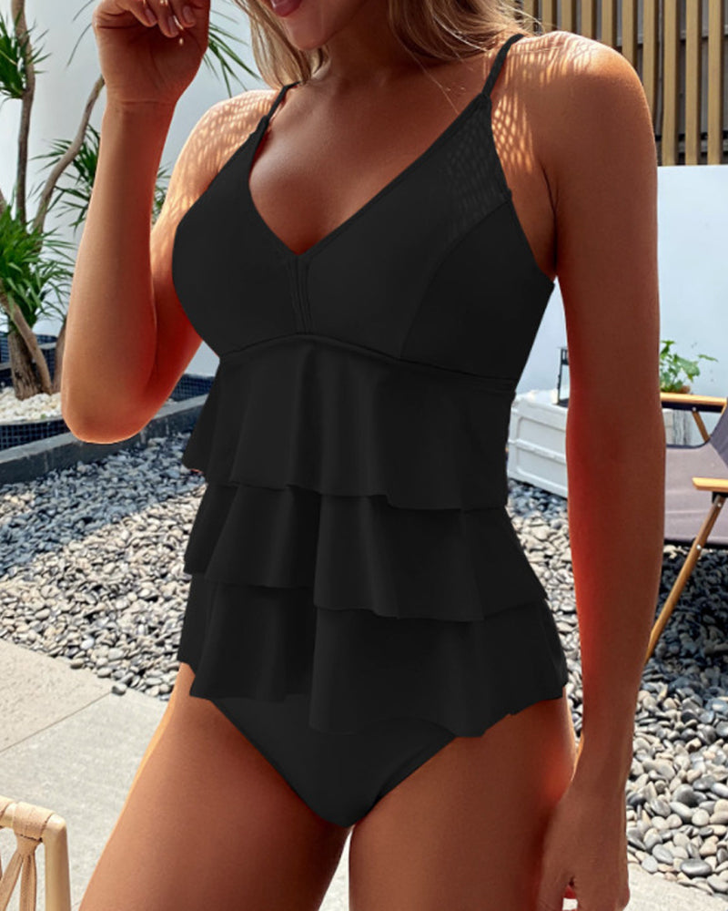 Tankini con volantes, de color sólido y con abertura