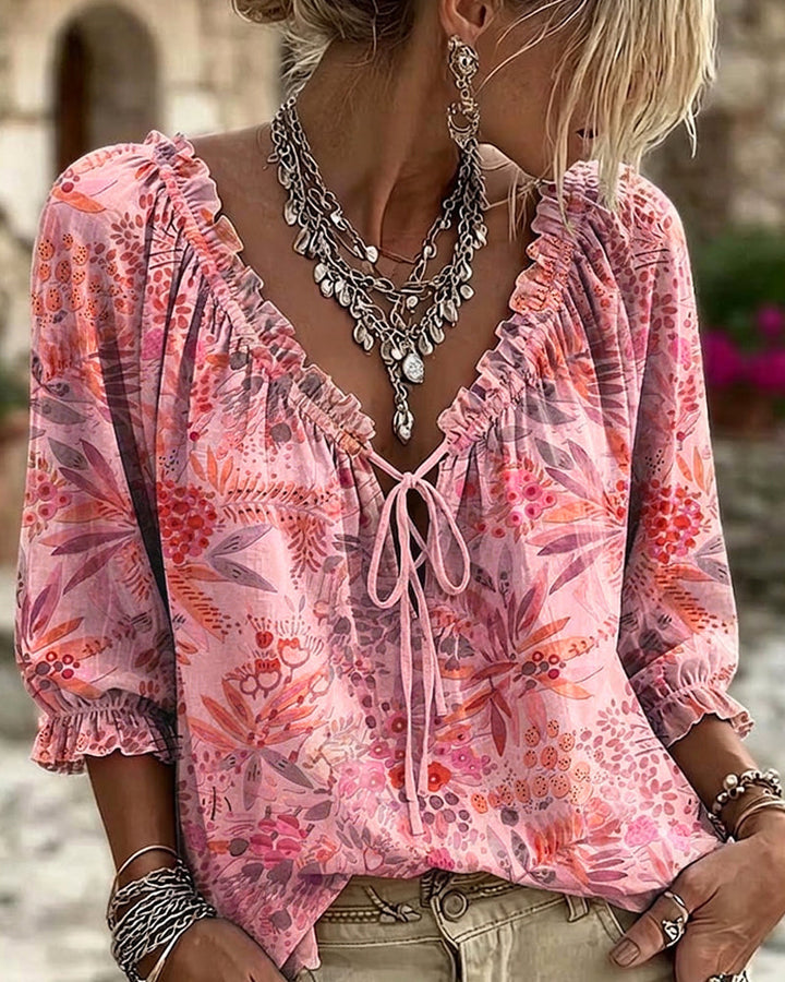 Blusa con escote en V y lazos