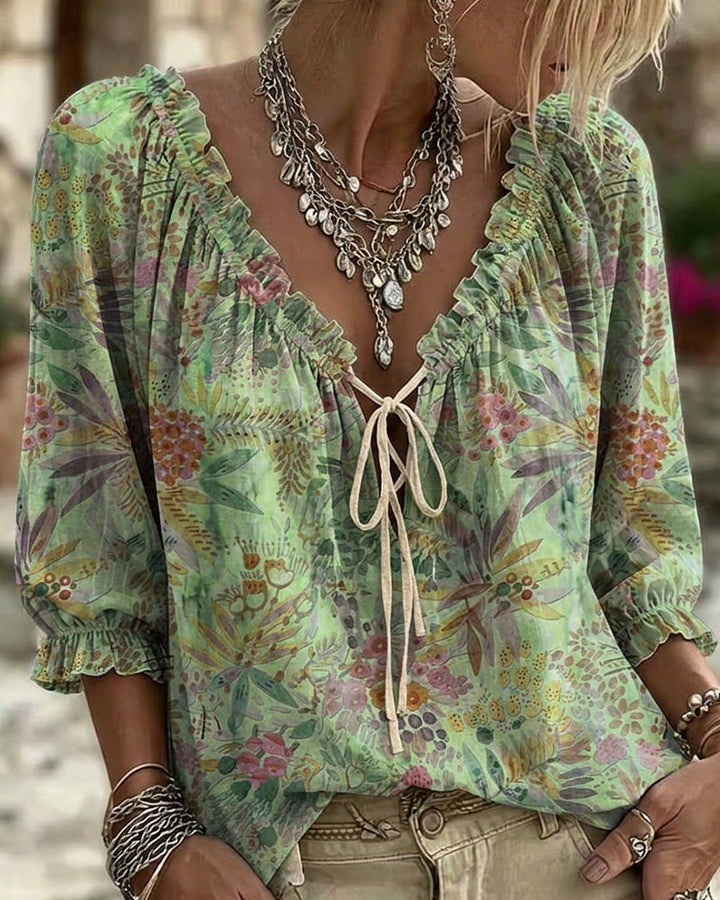 Blusa con escote en V y lazos